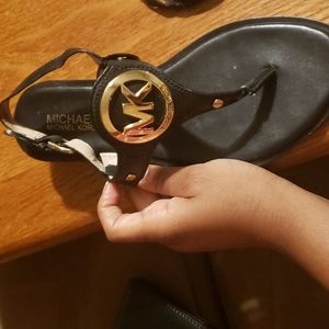 Black and gold Michael Kors sandals